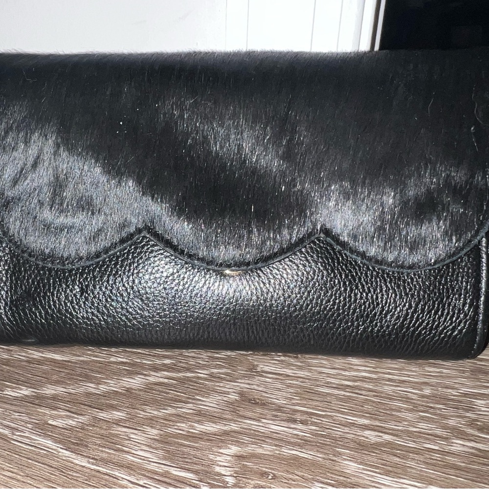 Black clutch/handbag with fur on front